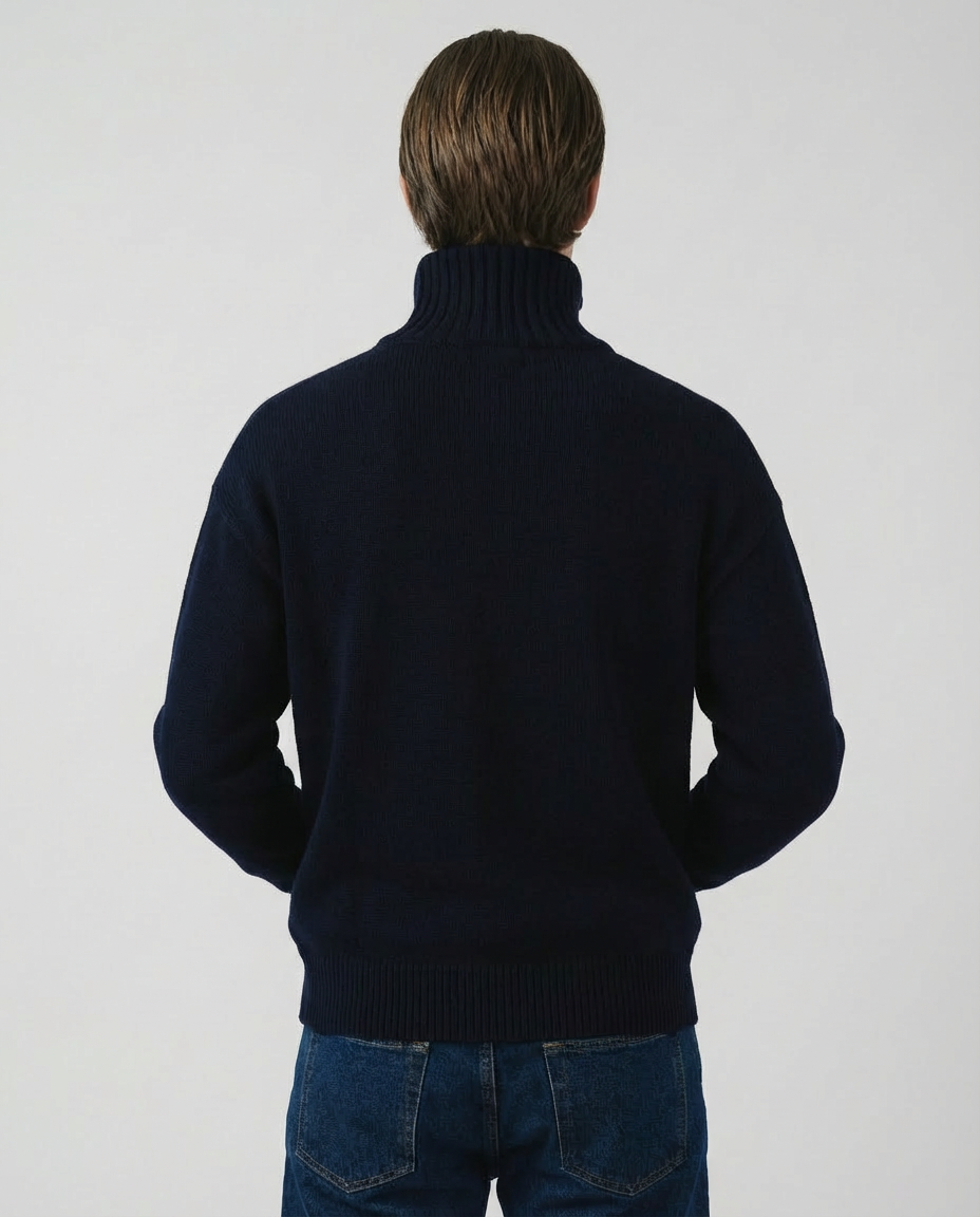 man wearing a dark blue navy zip-up cardigan sweater made in italy casa nodale merino wool and cashmere