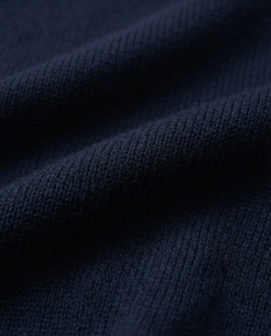 Close-up of dark blue fabric texture  dark blue navy turtleneck sweater made in italy casa nodale merino wool and cashmere