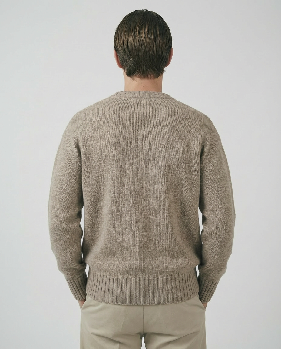 man wearing a beige taupe crewneck sweater made in italy casa nodale merino wool and cashmere